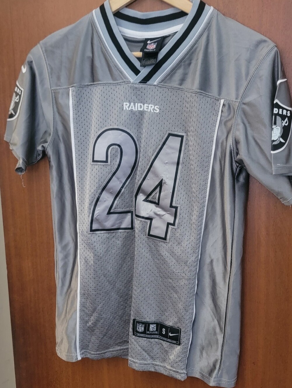 Nike NFL Raiders Charles Woodson #24 Silver/Black Jersey Youth Large (10-12)